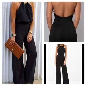 Black halter jump suit.