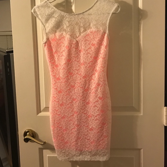 White lace dress with hot pink slip