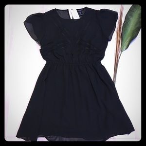 Flowy black mini dress NWT