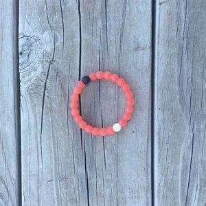 Small red lokai bracelet