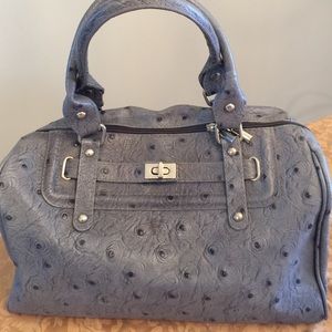 Genuine ostrich leather bag.