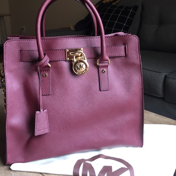 Burgundy w/gold accents Micheal Kors Hamilton bag.