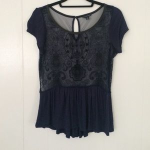 Navy peplum top with detailed beading