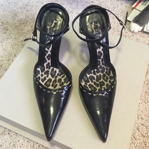 Black pointy toe pumps