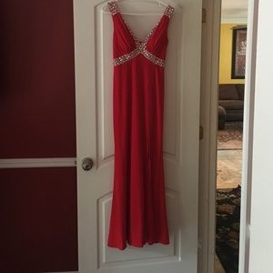 Beautiful long red Betsy & Adam dress with slit