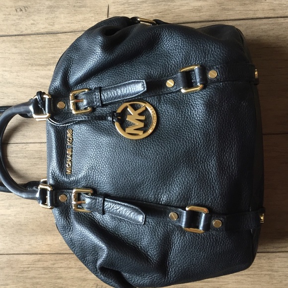 Black with gold accents Micheal Kors satchel