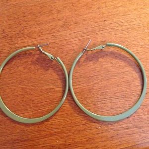 Never worn green hoop earrings