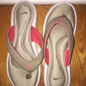 Nike flip flops.