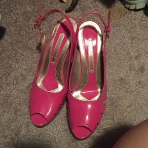 Pink patent leather peep toe pumps