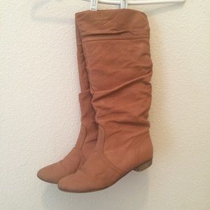 Steve Madden brown boots.
