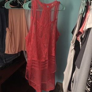 Cute see threw shirt long in the back