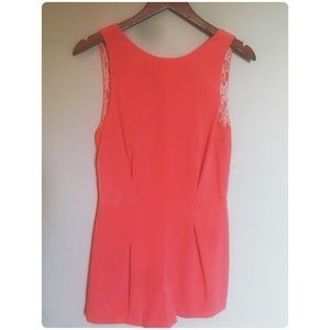 Pink romper with laced back