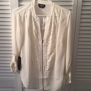 NWT Bebe blouse with lace detailing.