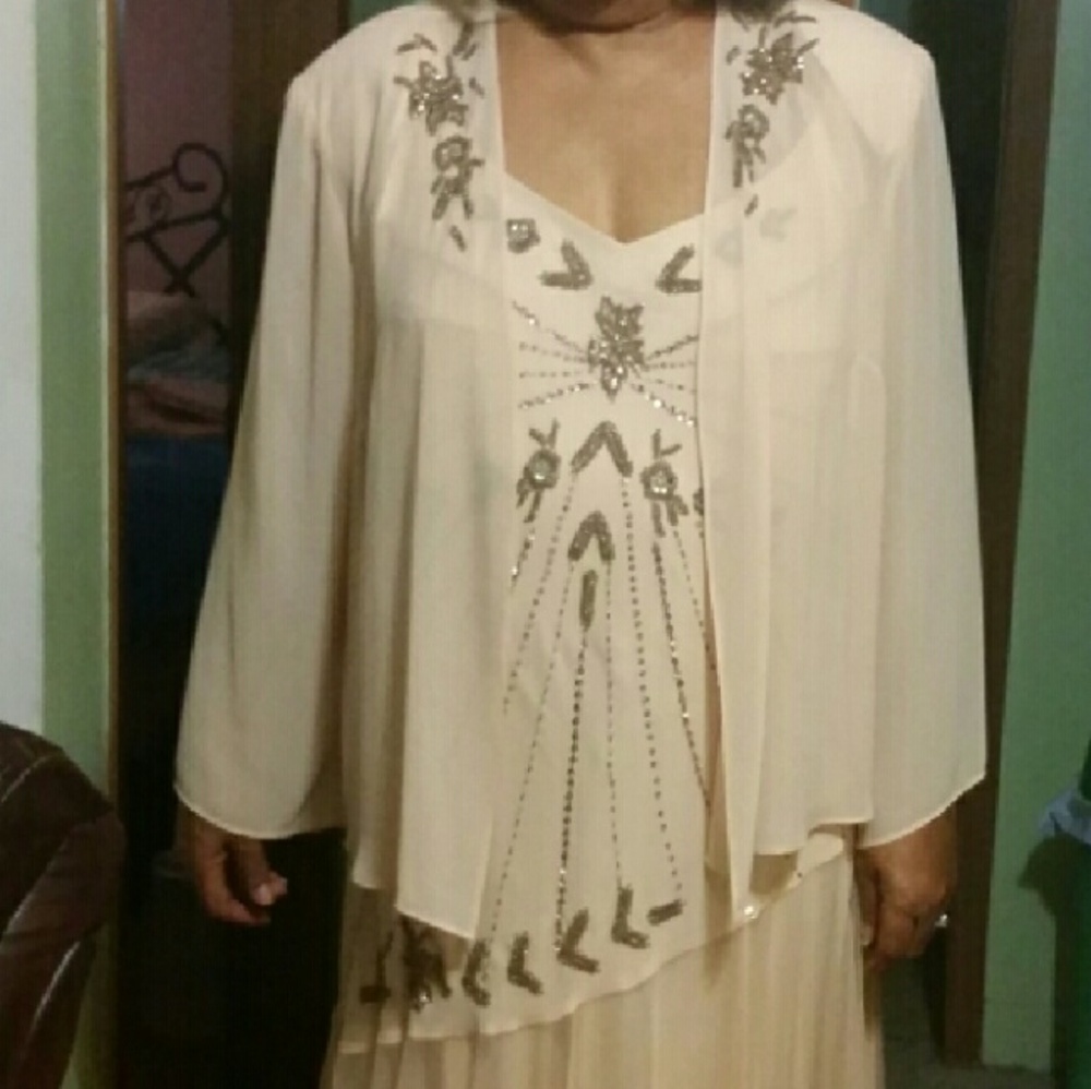 Elegant jeweled flowing  evening gown w/sheer jack