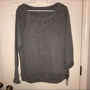 Gray sweater with gold and silver jewels