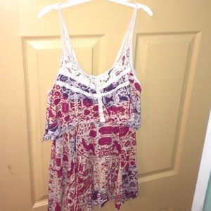 Flowy dress with patterns of birds on it