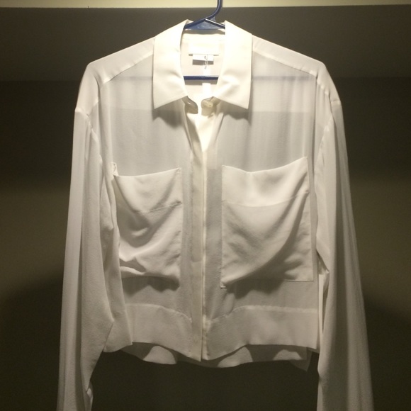 White DKNY cropped silk button up.