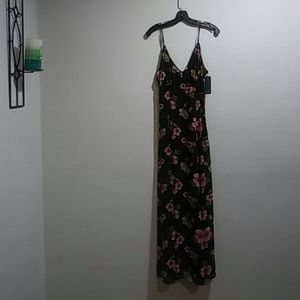 Long black floral dress.