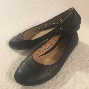 Black flats with cut outs