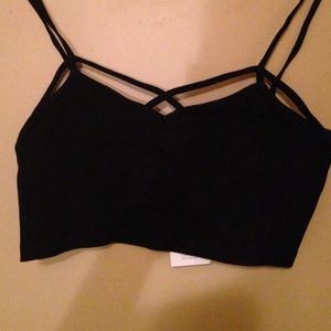 Black simple bralette with crossing in the front.