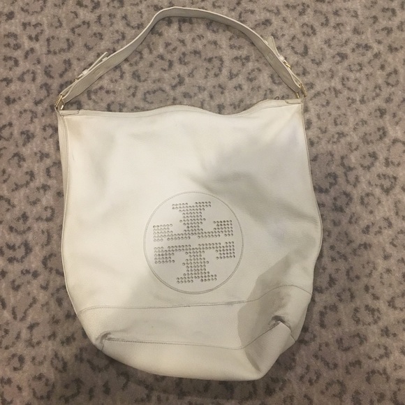 White Tory Burch purse. Woren see pics