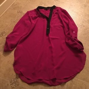 Dark pink blouse with black trim
