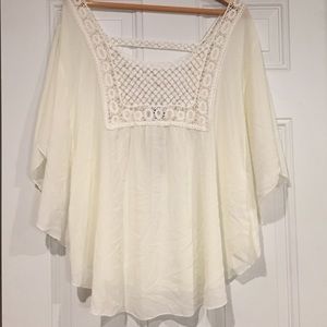 Cream blouse with lace detail