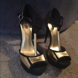 Black and gold stilettos in perfect condition!