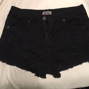 Black distressed short shorts