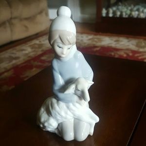 Lladro porcelain young girl with lamb.