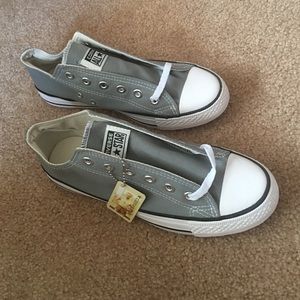 New, never worn, grey and white converse.
