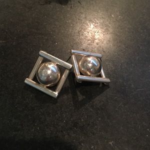 Sterling silver statement earrings.