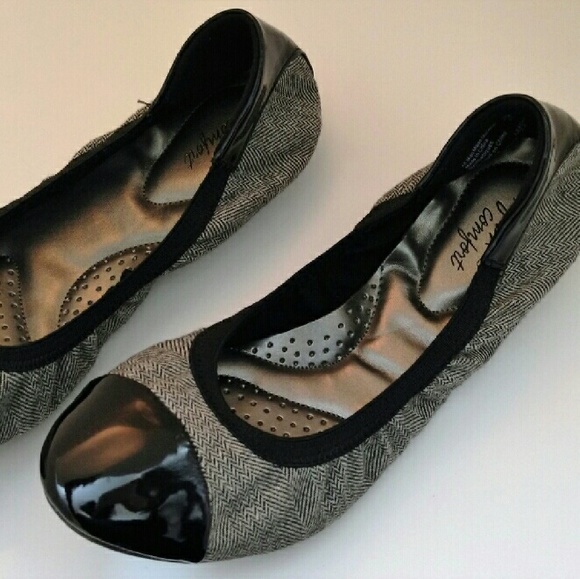 Black and gray flats with black toe tips