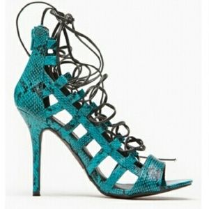 Lace up blue snakeskin heels