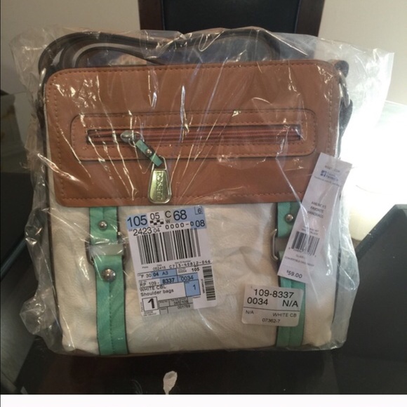 Handbags - Nwt cute cross over bag. Medium size.