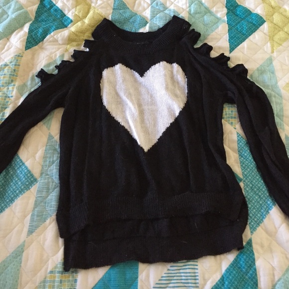 Sweater with slits in sleeves