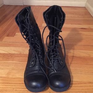 Lace up black combat boots