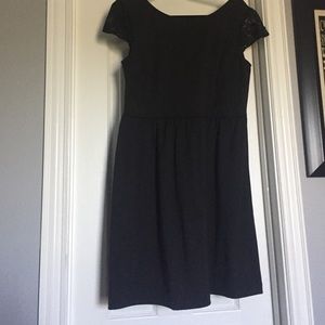 Little black dress with lace cap sleeves
