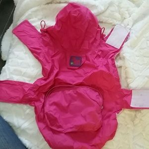 XS dog raincoat folds up into itself as bag