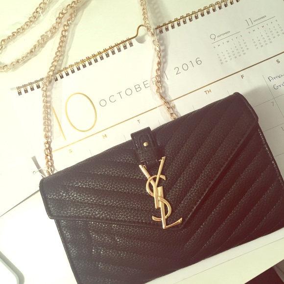 Black YSL clutch