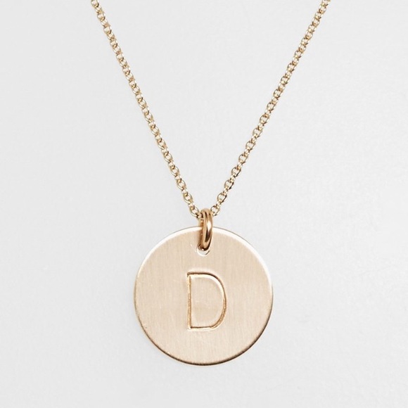 "D" initial disk charm