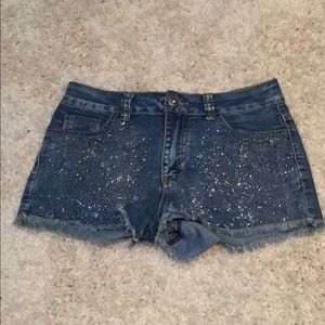 Studded and frayed Jean shorts