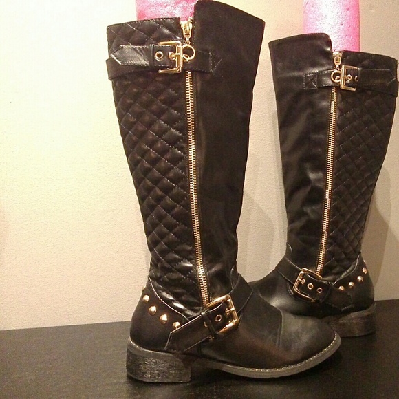 Black with gold riding boots.