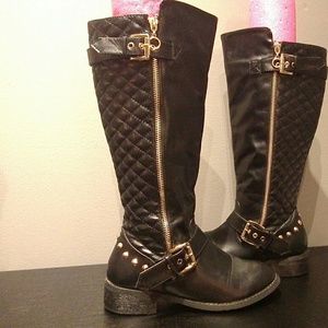 Black with gold riding boots.