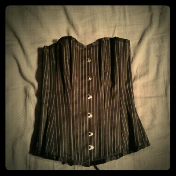 Rib crusher and or a corset