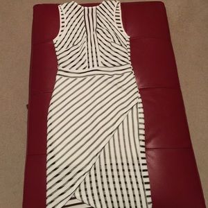 Knee length black n white dress.