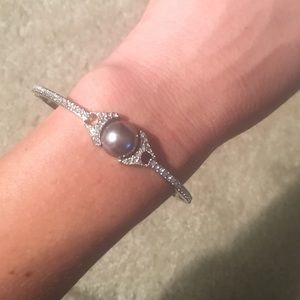 Silver hinged bracelet with grey pearl & gemstones