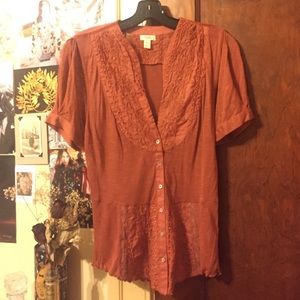 Orange embroidered blouse from Anthropologie