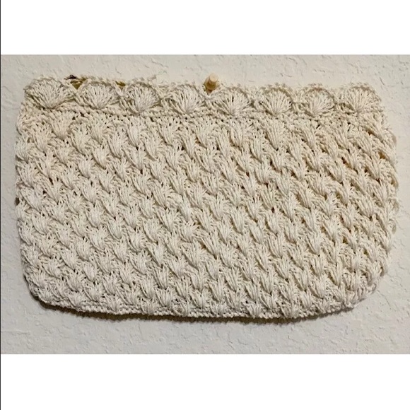 Cute white woven clutch!
