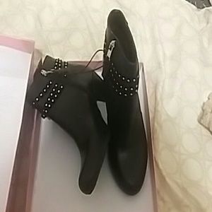 Black and gold boots